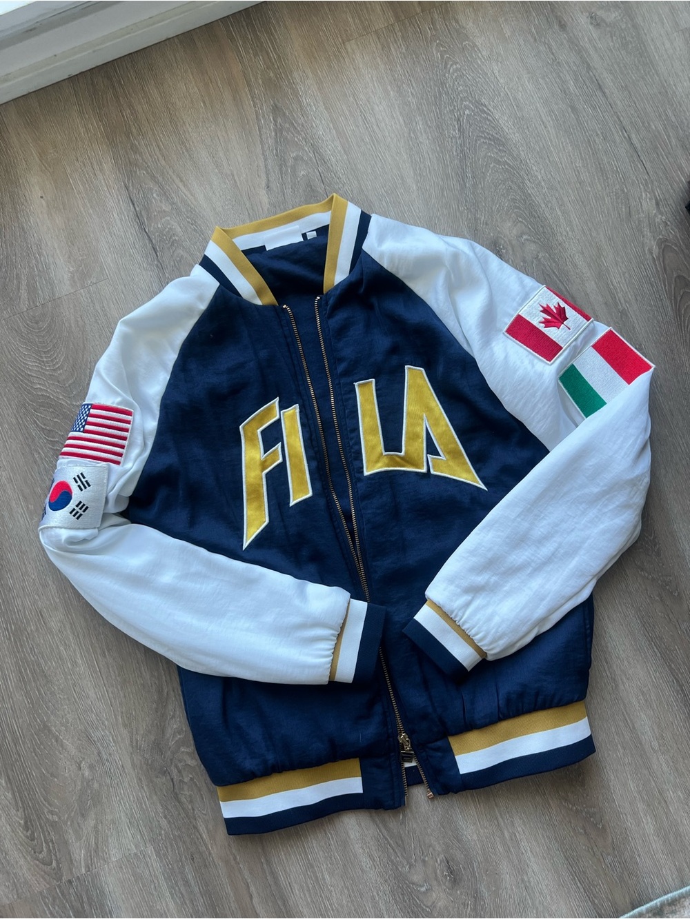 FILA urban outfitters satin bomber